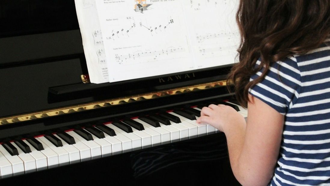 child piano lesson